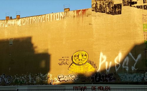 Graffiti on wall of old building