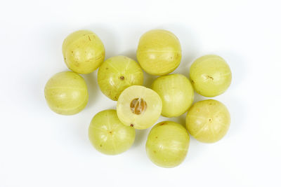 Close-up of fruits against white background