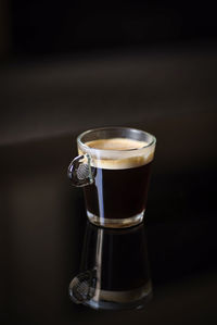 Close-up of coffee cup on table