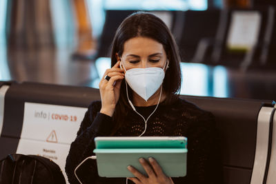 Young woman using mobile phone