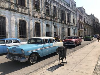 Vintage cars on old street in city in havana cuba