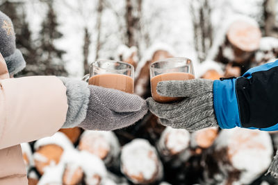 Close-up of hand holding ice cream