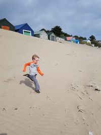 Full length of boy on beach