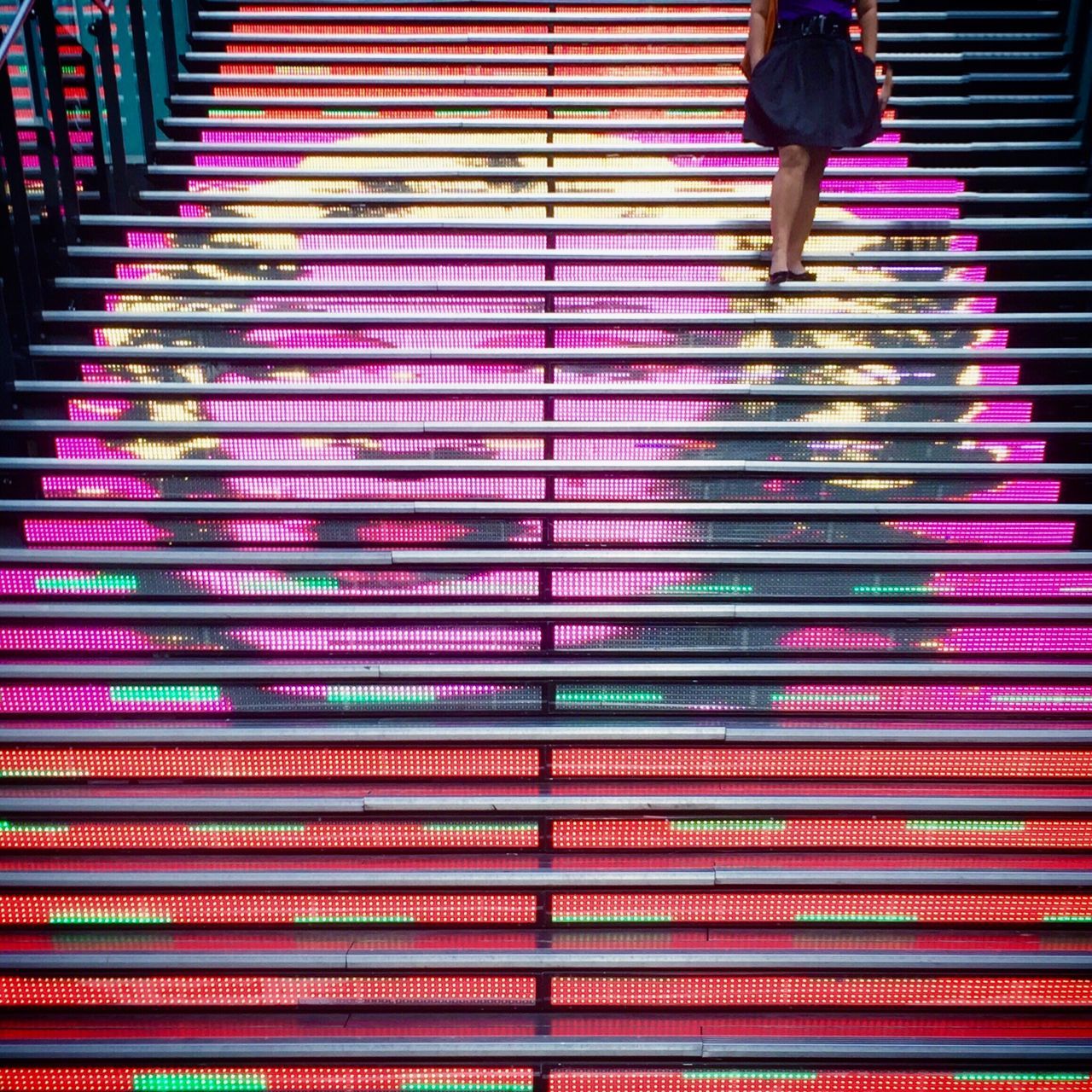 red, lifestyles, standing, pattern, indoors, person, steps, low section, striped, leisure activity, multi colored, walking, rear view, casual clothing, steps and staircases, men, pink color