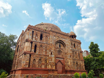 Low angle view of historic building against sky