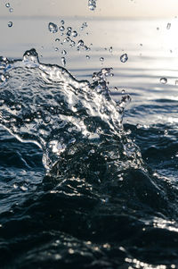 Close-up of water splashing in sea