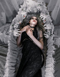 Portrait of young woman wearing mask