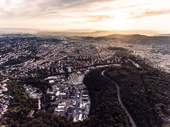 Aerial view of cityscape during sunset