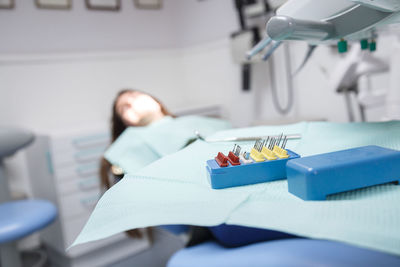 Close-up of dental equipment on table in clinic