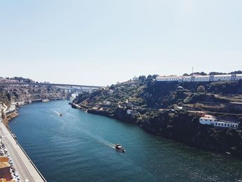 High angle view of city at riverbank