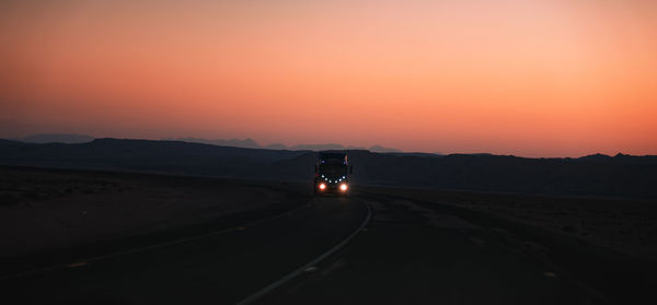 Road against sky during sunset