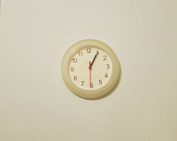 Clock on white wall