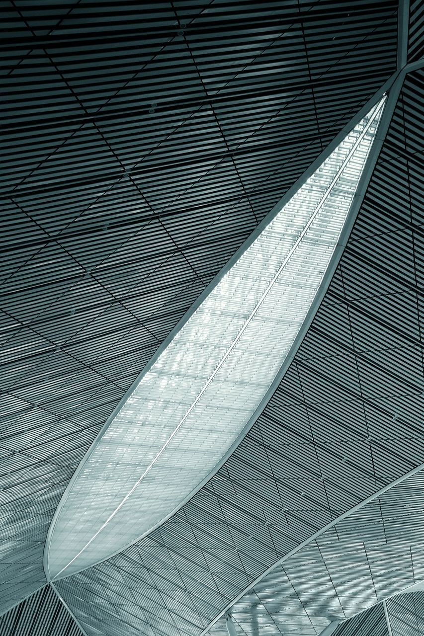 LOW ANGLE VIEW OF GLASS ROOF