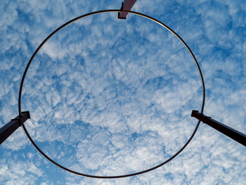 Low angle view of basketball hoop against sky