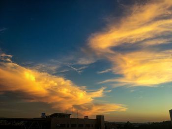 Cityscape against sky during sunset