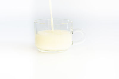 Close-up of drink against white background