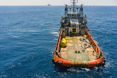 Ship in sea against sky