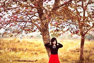 Woman standing on field