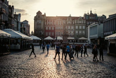 People at town square during sunset