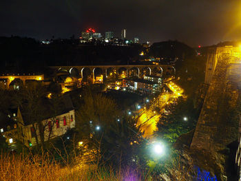 High angle view of illuminated buildings at night