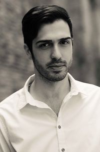 Portrait of young man standing outdoors