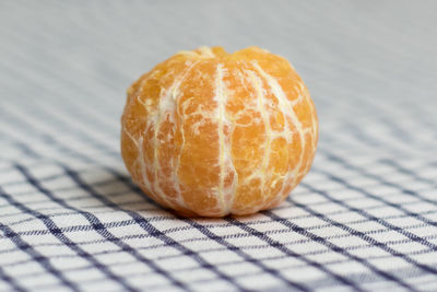 Close-up of orange fruit on table