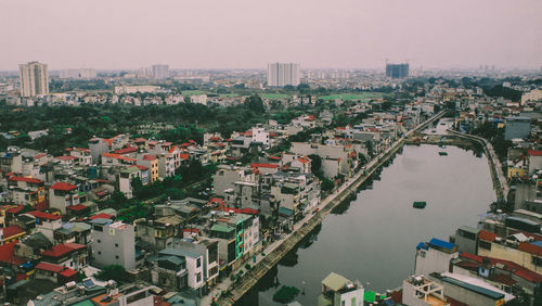 High angle view of buildings against sky in city