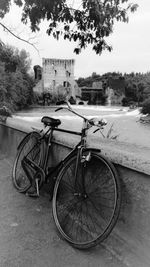 Bicycle parked on road