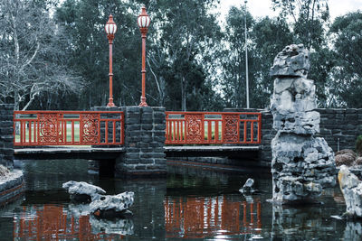 View of an animal sculpture by lake