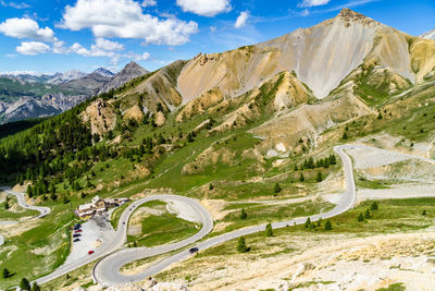 The scenic serpentine road climbing up to the col d'izoard, france