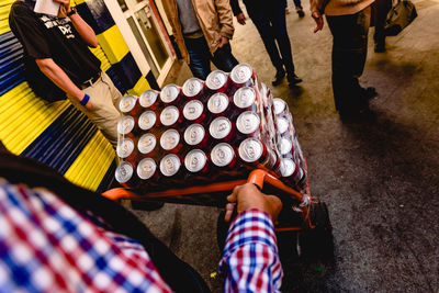 Low section of people holding food