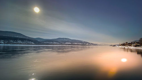 Scenic view of sea against sky during sunset