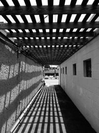 Empty walkway in front of building