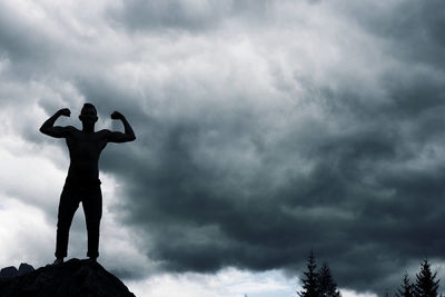 Low angle view of statue against sky