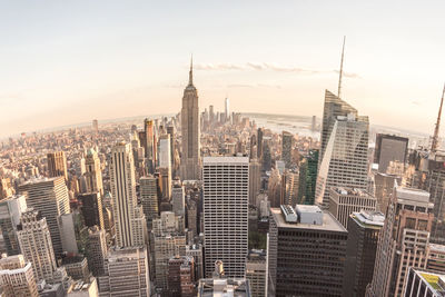 Modern buildings in city against sky