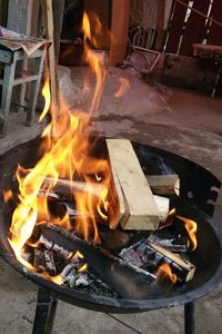 High angle view of burning fire pit in yard