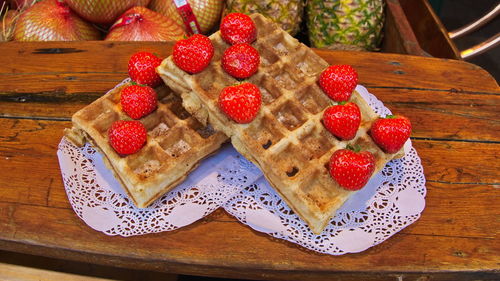 High angle view of strawberries on table