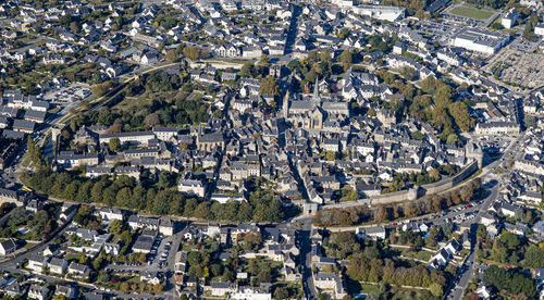 High angle view of trees and houses in town