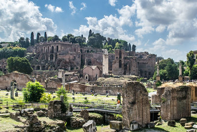 Ruins of the roman forum. rome, italy. summer blue sky wide angle landscape view. 