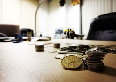 Close-up of coins on table