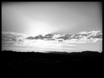 Scenic view of landscape against sky during sunset