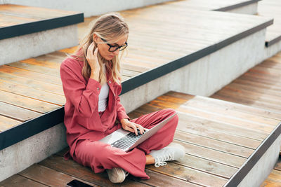 Young woman using mobile phone