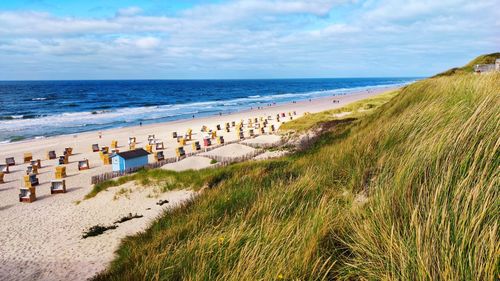 Scenic view of beach against sky