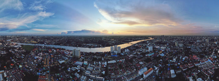 High angle view of cityscape against sky during sunset