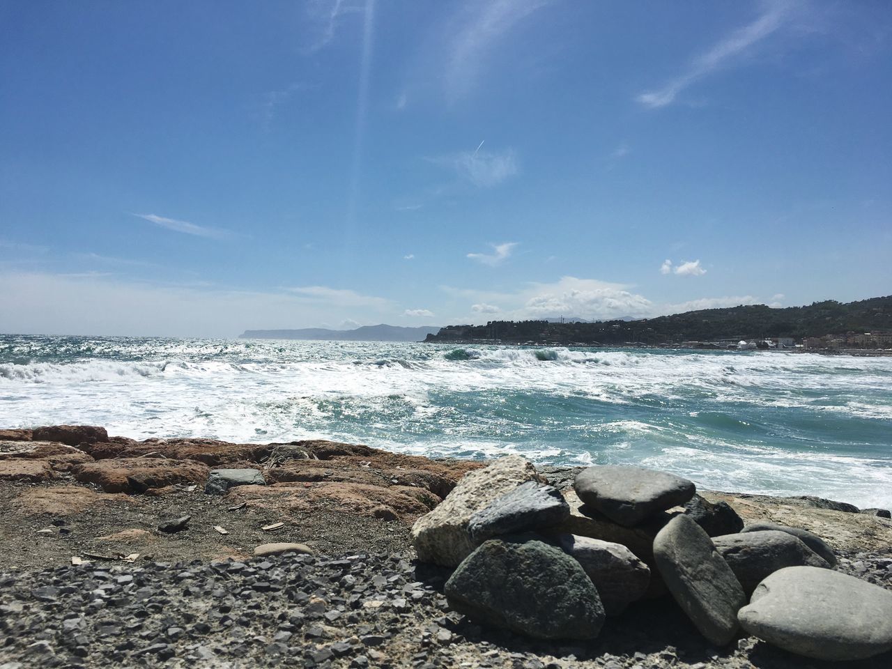 water, rock, sea, sky, solid, beach, rock - object, land, beauty in nature, scenics - nature, nature, tranquility, wave, motion, day, tranquil scene, cloud - sky, no people, non-urban scene, outdoors, pebble