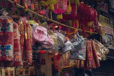 Multi colored lanterns hanging in market stall