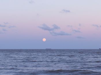 Scenic view of sea against sky at sunset