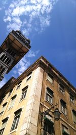 Low angle view of building against blue sky