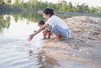 Portrait of happy loving mother and her baby outdoors. person