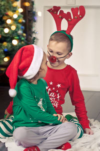 Cute kids wearing costume at home